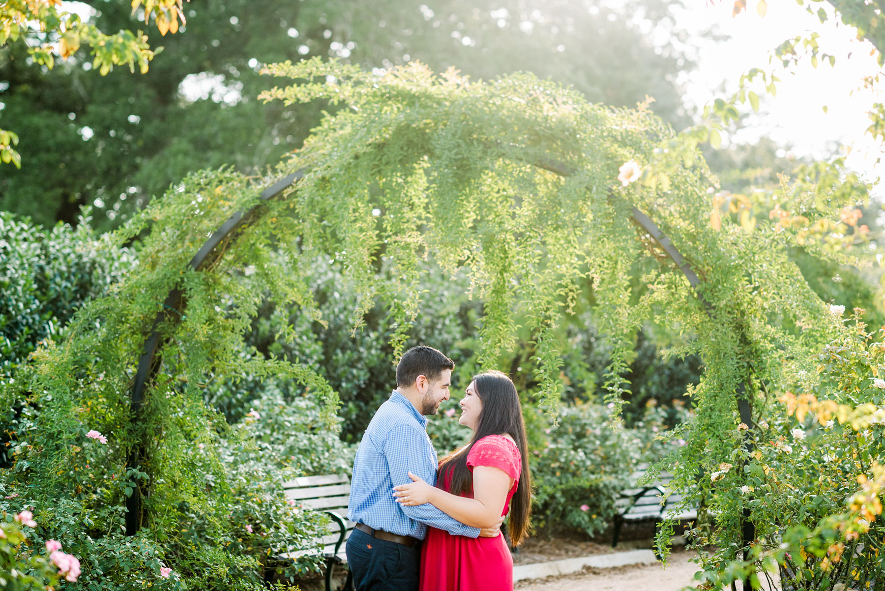 Gabe & Jessica embracing under huge tree